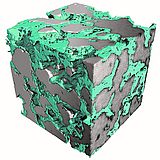 Grauer 3D-Würfel mit grünen Teilen